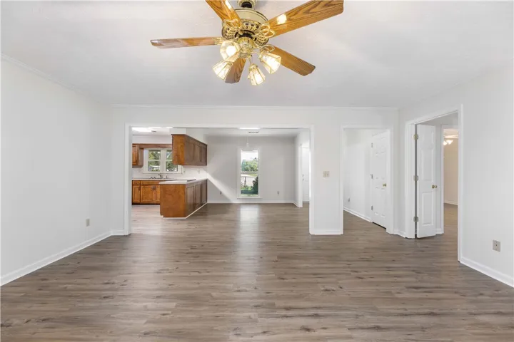 An open floor plan seamlessly connects the main living area with the adjacent kitchen.