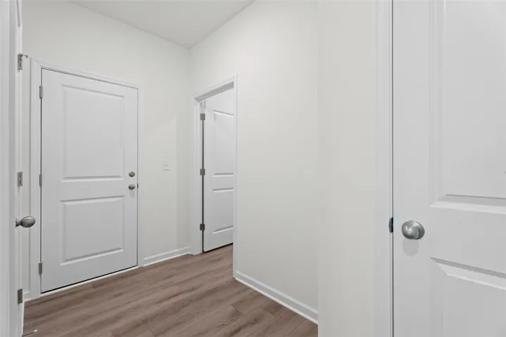 For representative purposes only - Hallway to half bath and garage