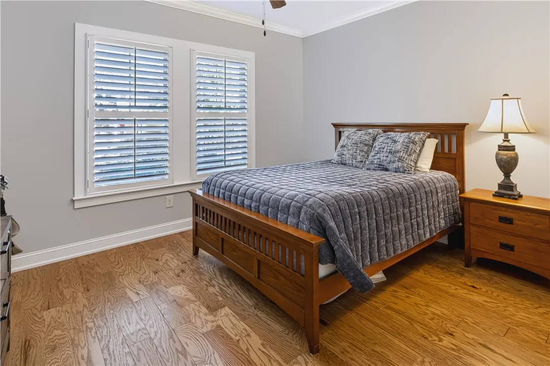 Third bedroom includes spacious walk-in closet for wardrobe and storage.