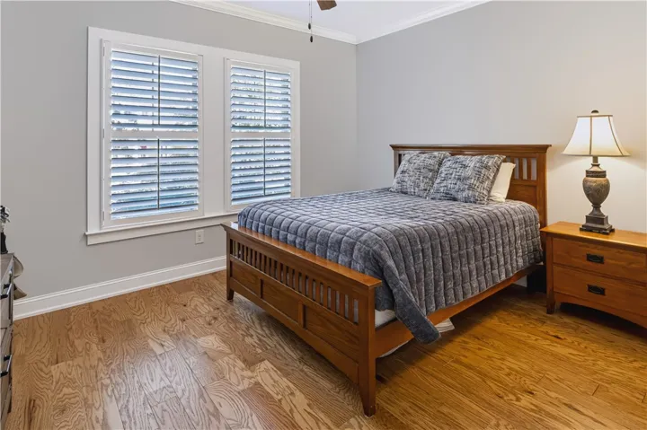 Third bedroom includes spacious walk-in closet for wardrobe and storage.