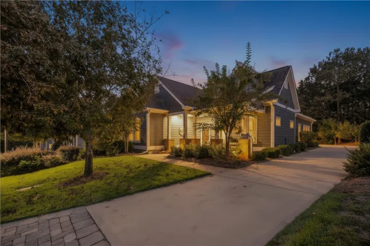 Mature landscape frames the entire property offering  curb appeal & privacy.