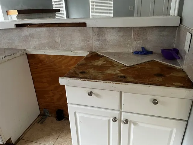 A partially disassembled kitchen workspace provides an excellent opportunity for custom renovation projects.