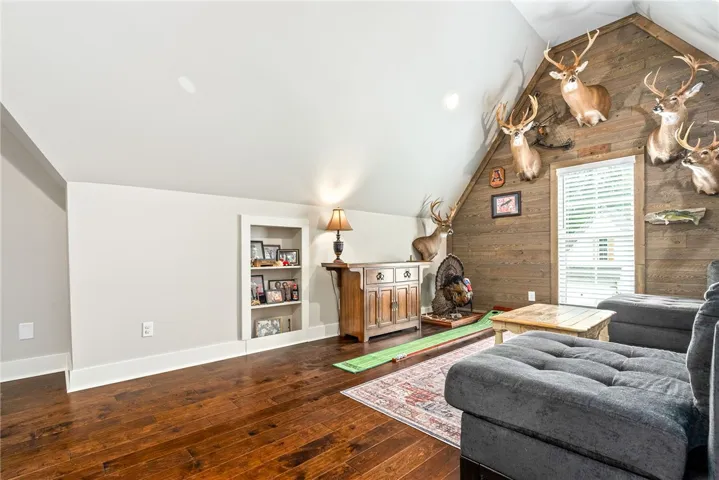 Bonus room is big enough for a sofa and sitting area.