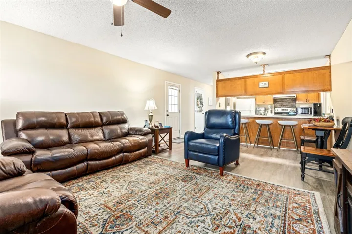 An open floorplan seamlessly connects the living area with a functional kitchen layout.
