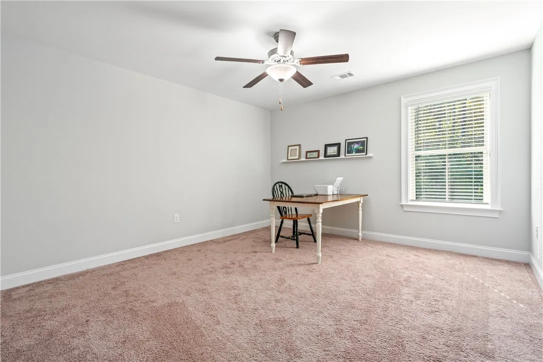 The third bedroom is spacious enough for any need or layout.