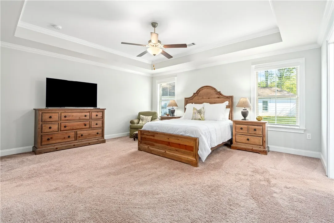 You may never want to leave your oversized primary suite, tucked quaintly down it's own "wing" offering a peaceful retreat from a long day.