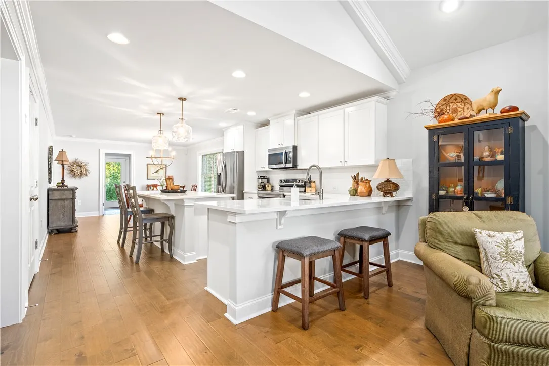 BONUS with large eat-at island PLUS eat-at extended bar/countertop is ready to welcome all your family and friends!