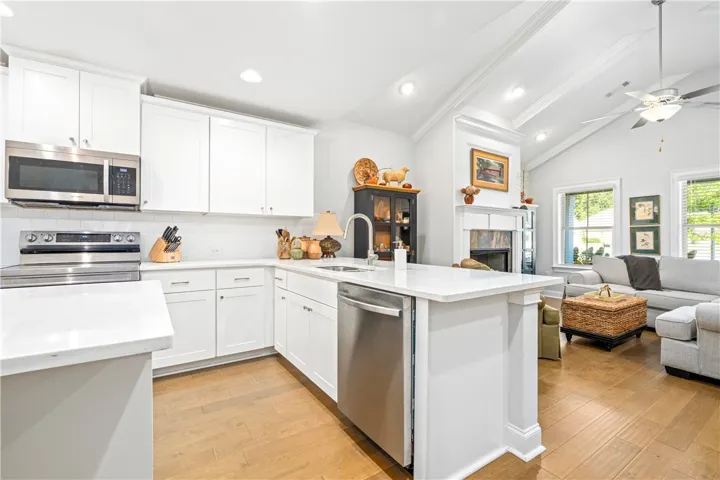 Lots of beautiful quartz countertop space to cook and entertain.