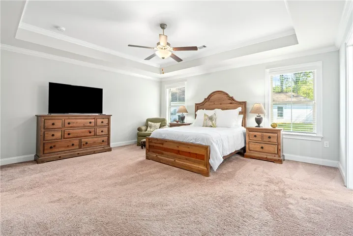 You may never want to leave your oversized primary suite, tucked quaintly down it's own "wing" offering a peaceful retreat from a long day.