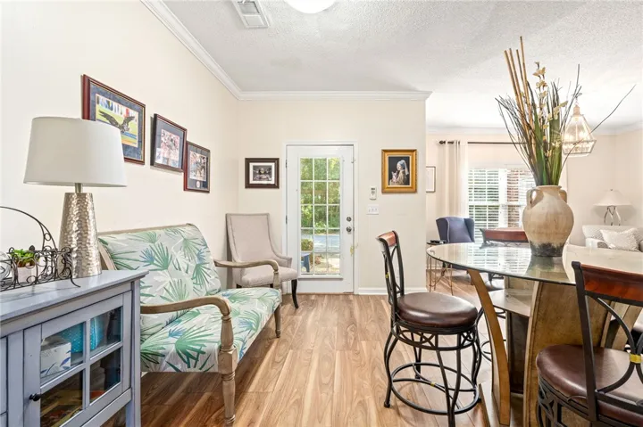 An inviting open floorplan flows seamlessly from the entry into the light-filled dining space.