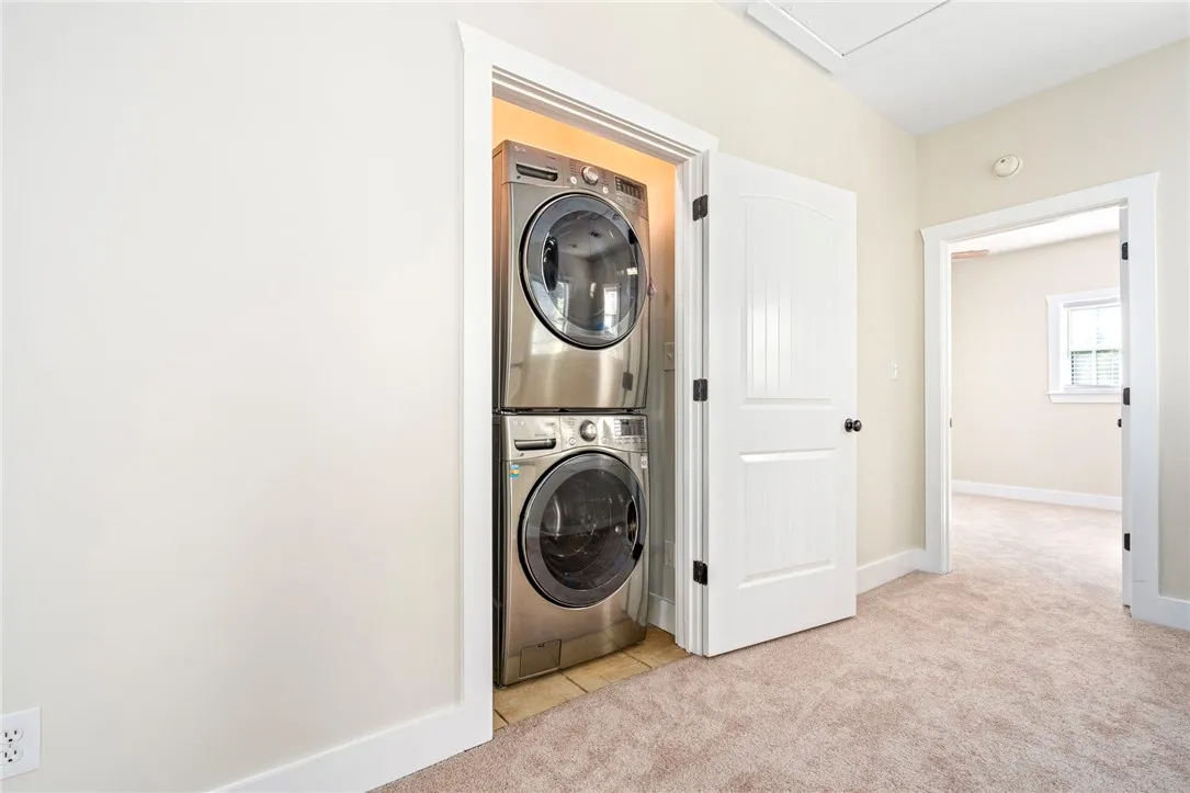 Washer and dryer included and tucked away in this hallway closet.