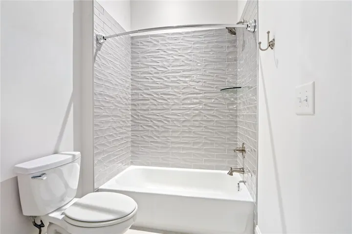 The separate tub and shower room allows the vanity area to be used privately and simultaneously.
