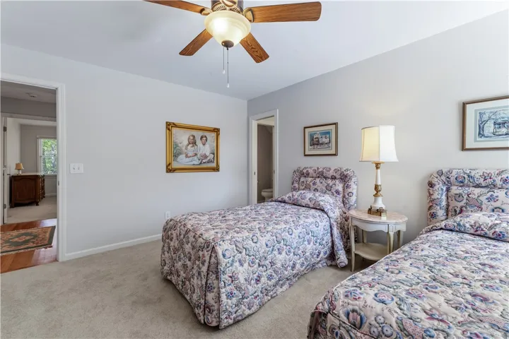 Smooth plaster walls and soft carpeting define this inviting secondary suite layout.