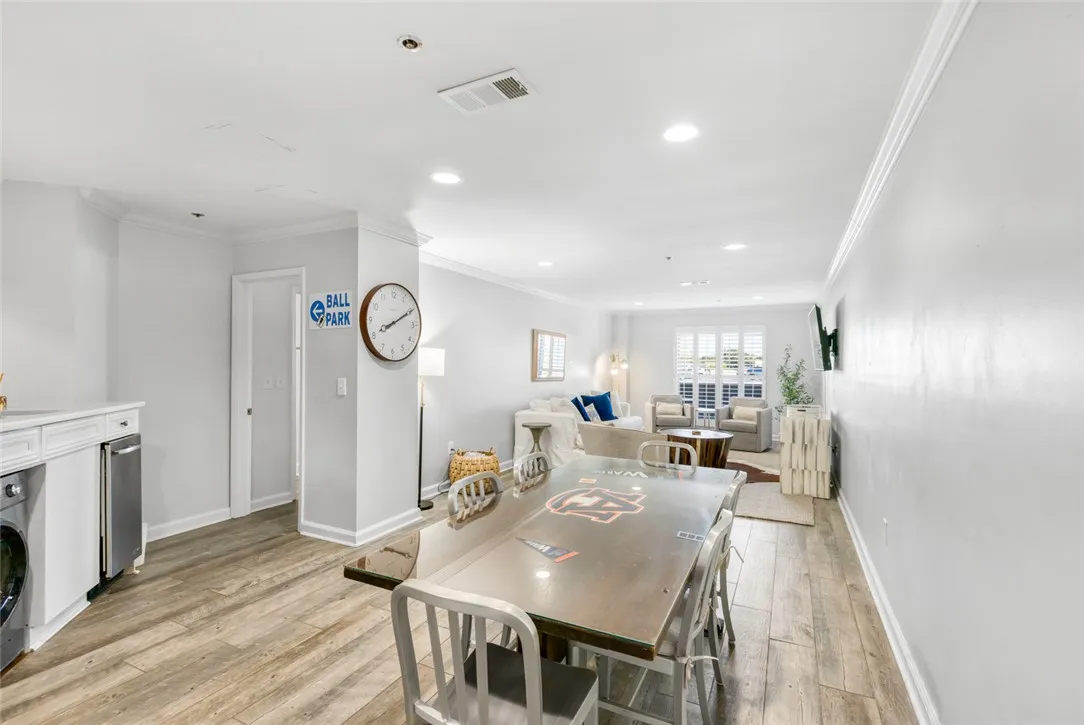 Clean lines and classic trim define this open concept living and dining space.