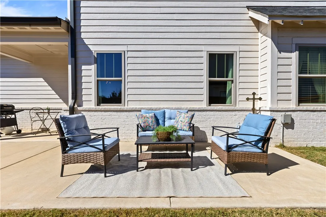 Enjoy both covered & open patios for entertaining, tailgating and more!