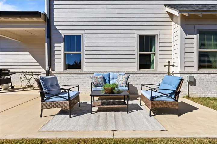 Enjoy both covered & open patios for entertaining, tailgating and more!