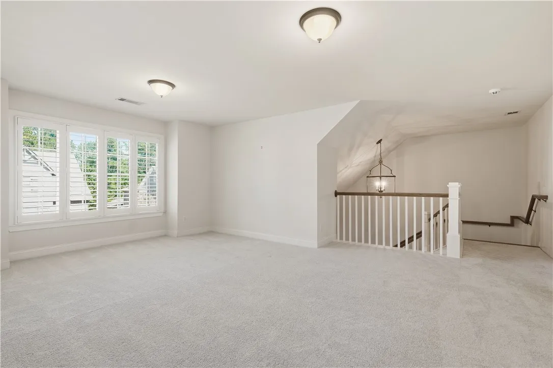 Located at the top of the stairs, the spacious loft provides a versatile spot for all ages.