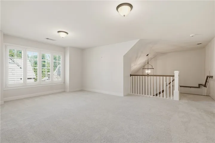 Located at the top of the stairs, the spacious loft provides a versatile spot for all ages.
