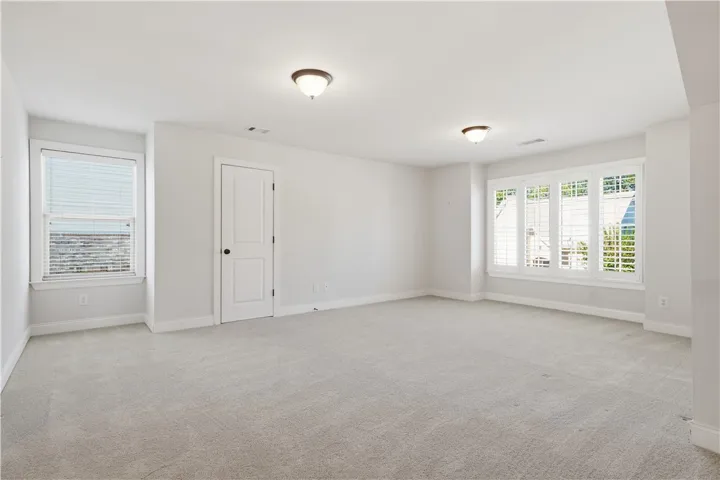 The bonus room is light-filled and versatile.