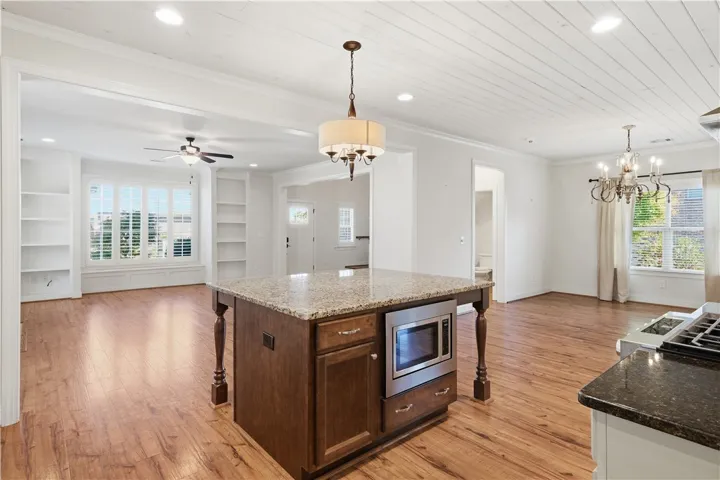 The kitchen is open to both the living room and the dining room.