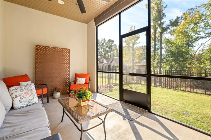 Screened porch adds extended outdoor living space just off of living room