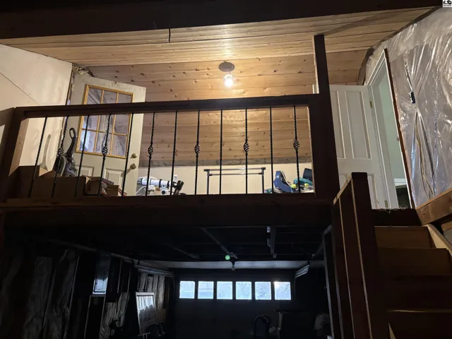 Bridge connects 2 floor living space to outdoor deck.