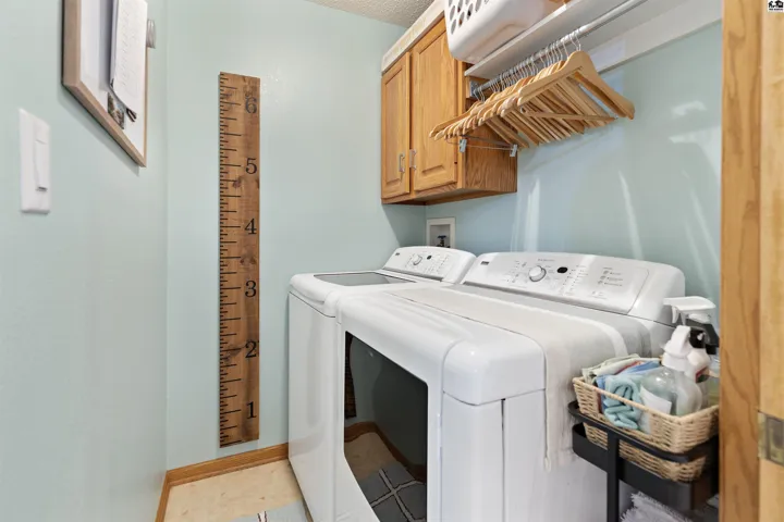 Located in Hallway between kitchen and upstairs 2nd bedroom