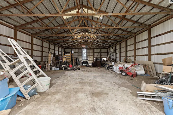 42 x 72 shop 1/3 concrete floor, 14' Sidewalls. Shop previously had power, lines were knocked down.