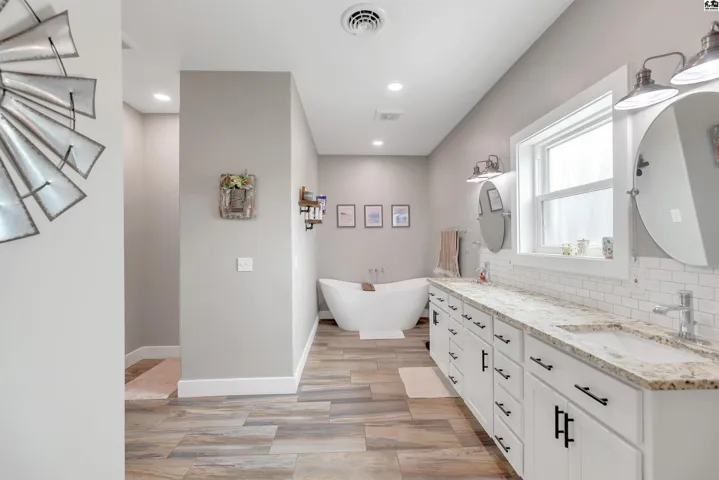 Master Bathroom with soaking tub and double sink