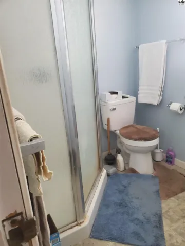 This bathroom is off of the laundry room.