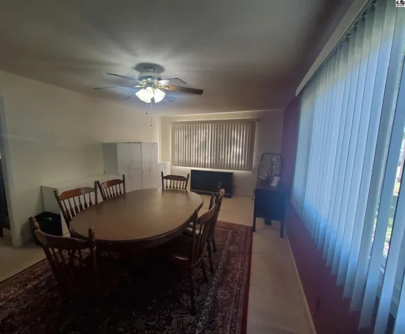 This room could be used as a dining room or family room.