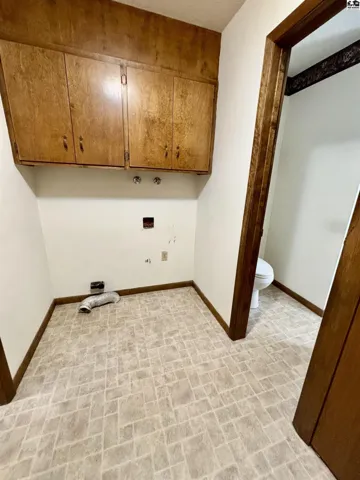 Main floor laundry in the mudroom, just off kitchen. Handy 3/4 bath here as well.