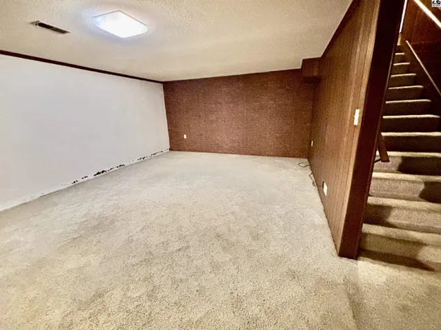 Spanning the entire front of the home, there's tons of room for movies and play.