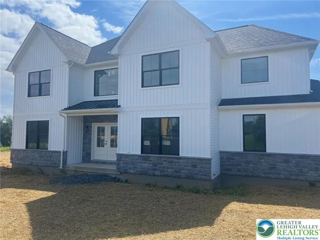 Fairview Farmhouse now ready on Lot 9. Available to be built on any lot.