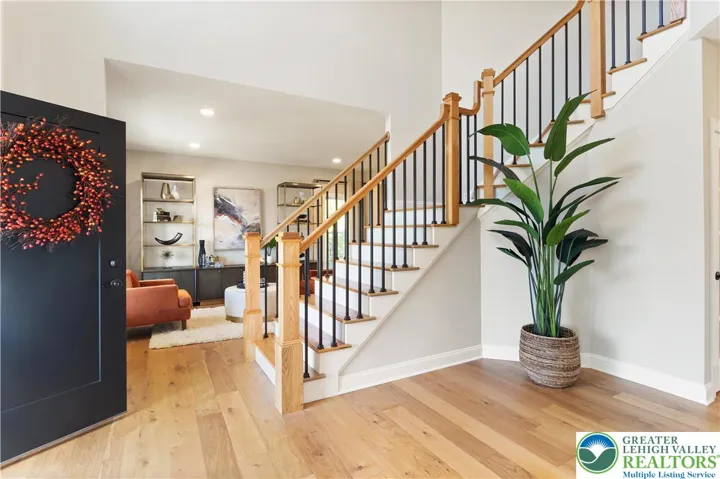 *Photos are of a previously built model and may contain upgrades not included in the base price* Foyer