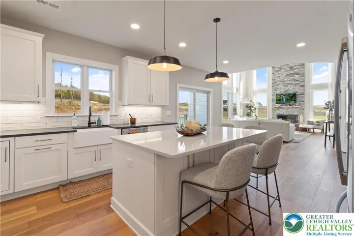 *Photos are of a previously built model and may contain upgrades not included in the base price* Kitchen