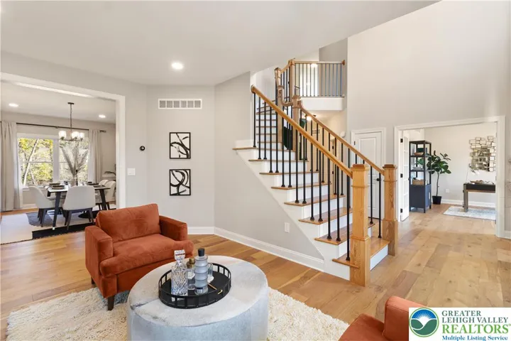 *Photos are of a previously built model and may contain upgrades not included in the base price* Living Room