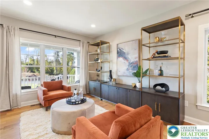 *Photos are of a previously built model and may contain upgrades not included in the base price* Living Room