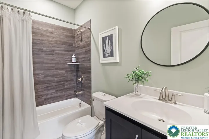 *Photos are of a previously built model and may contain upgrades not included in the base price* Private Bath