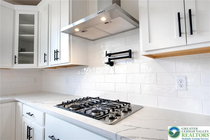 Pot filler and beautiful workmanship throughout.