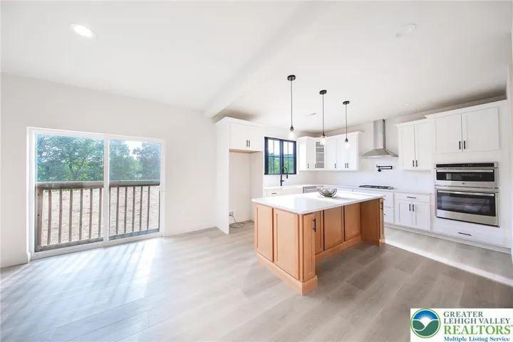Large breakfast area with additional cabinets. Beautiful views from all windows too.