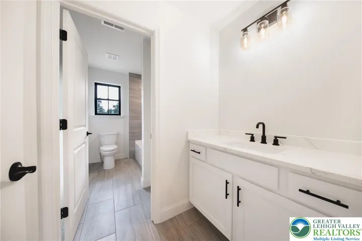 Elegant hall bath.