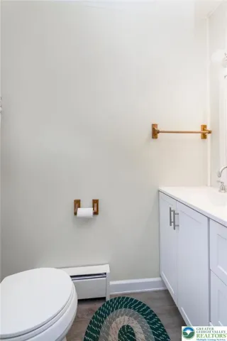 Half Bathroom w/ Laminate Flooring