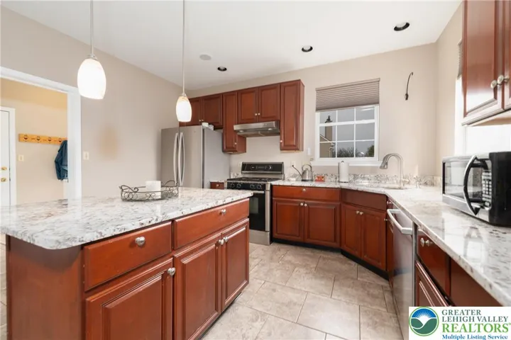 Large Updated Kitchen with Granite Countertops
