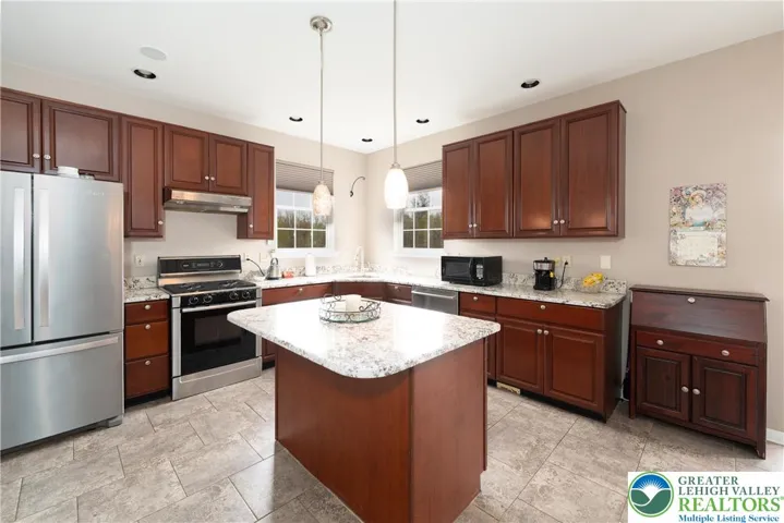 Large Updated Kitchen with Granite Countertops