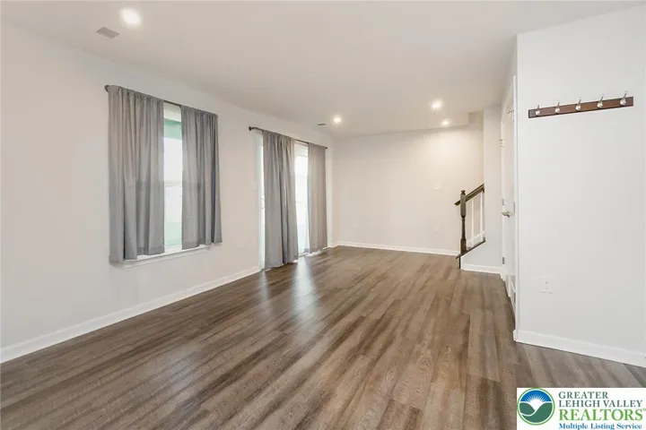 Family room with sliding door to outside backyard