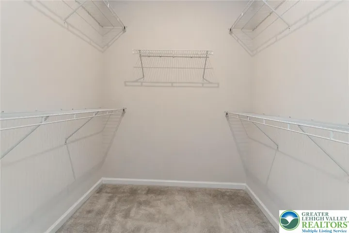 walk-in closet in primary bedroom