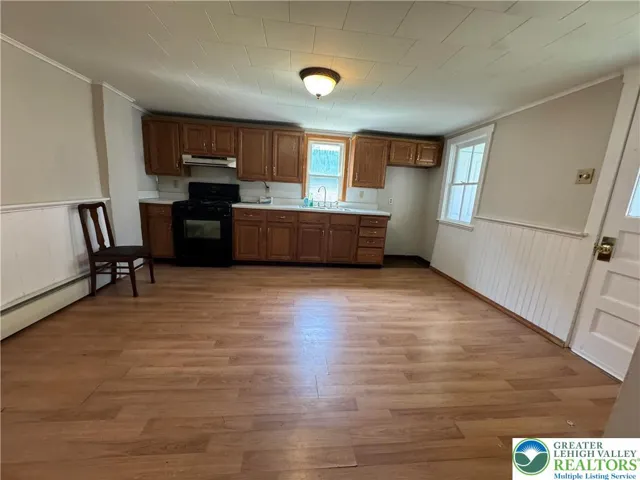 Large eat in kitchen with New flooring