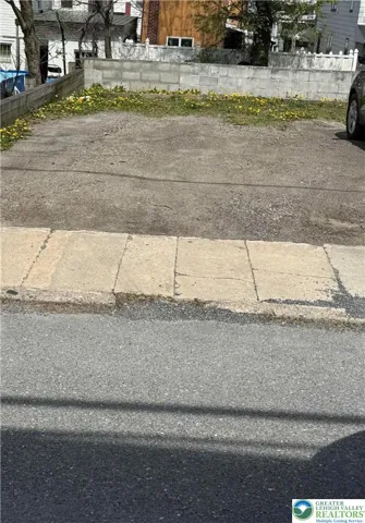 Parking pad located across the street from the home