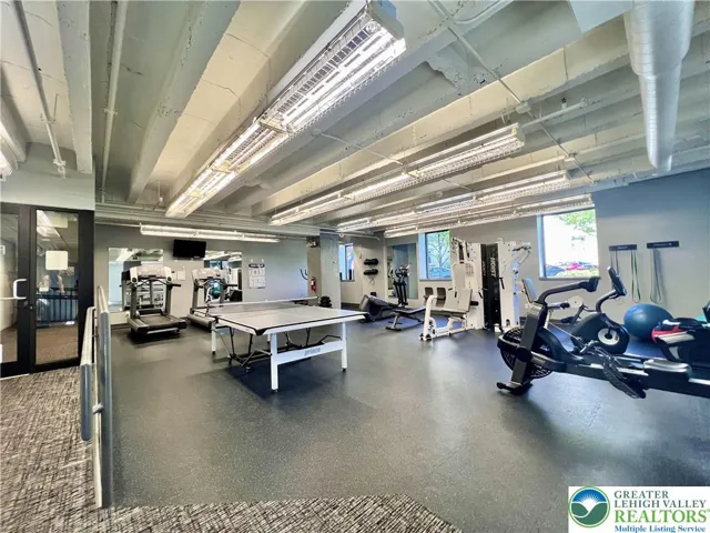 downstairs, find a nicely-equipped gym.